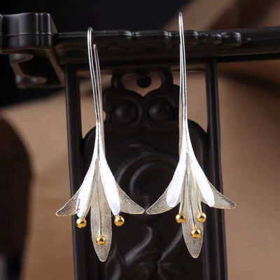 Tyra™ | Boucles d'oreilles en argent avec fleur
