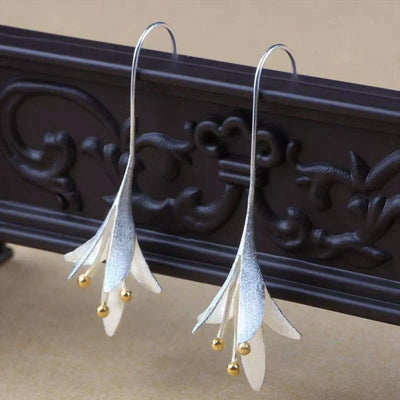 Tyra™ | Boucles d'oreilles en argent avec fleur